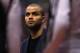 LOS ANGELES, CA - FEBRUARY 18: Tony Parker of the San Antonio Spurs looks on from the bench against the Los Angeles Clippers in the first half at Staples Center on February 18, 2014 in Los Angeles, California. NOTE TO USER: User expressly acknowledges an