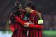 MILAN, ITALY - FEBRUARY 19: Ricardo Kaka (R) of AC Milan speaks to his team mate Mario Balotelli (L) during the UEFA Champions League Round of 16 match between AC Milan and Club Atletico de Madrid at Stadio Giuseppe Meazza on February 19, 2014 in Milan,