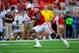 LINCOLN, NE - SEPTEMBER 7: Cornerback Stanley Jean-Baptiste #16 of the Nebraska Cornhuskers intercepts a pass in front of wide receiver Rickey Bradley #81 of the Southern Miss Golden Eagles during their game at Memorial Stadium on September 7, 2013 in Lin