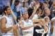 Feb 22, 2014; Chapel Hill, NC, USA; North Carolina Tar Heels forward James Michael McAdoo (43) and guard Marcus Paige (5) react on the bench late in the second half. The Tar Heels defeated the Demon Deacons 105-72 at Dean E. Smith Student Activities Cente