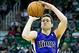 Jan 27, 2014; Salt Lake City, UT, USA; Sacramento Kings point guard Jimmer Fredette (7) shoots during the first half against the Utah Jazz at EnergySolutions Arena. Mandatory Credit: Russ Isabella-USA TODAY Sports