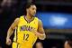 Feb 25, 2014; Indianapolis, IN, USA; Indiana Pacers guard Evan Turner (12) runs up the floor during a game against the Los Angeles Lakers at Bankers Life Fieldhouse. Mandatory Credit: Brian Spurlock-USA TODAY Sports