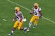 TAMPA, FL - JANUARY 1: Wide receiver O'Dell Beckham Jr. #3 of the LSU Tigers returns a kick with Lionel Williams #14 leading the way against the Iowa Hawkeyes January 1, 2014 in the Outback Bowl at Raymond James Stadium in Tampa, Florida. LSU won 21