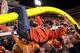 STILLWATER, OK - DECEMBER 03: Oklahoma State Cowboys fans hang on the goal post after a 44-10 win against the Oklahoma Sooners at Boone Pickens Stadium on December 3, 2011 in Stillwater, Oklahoma. (Photo by Ronald Martinez/Getty Images)