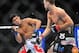 August 4, 2012; Los Angeles, CA, USA; Nam Phan avoids Cole Miller during the featherweight match at Staples Center. Mandatory Credit: Gary A. Vasquez-USA TODAY Sports