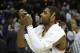 Feb 19, 2014; Cleveland, OH, USA; Cleveland Cavaliers point guard Kyrie Irving (2) catches a piece of confetti after a 101-93 win over the Orlando Magic at Quicken Loans Arena. Mandatory Credit: David Richard-USA TODAY Sports