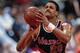 LOS ANGELES, CA - 1987: Maurice Lucas #20 of the Portland Trailblazers shoots against the Los Angeles Clippers circa 1987 at the LA Sports Arena in Los Angeles, California. NOTE TO USER: User expressly acknowledges and agrees that, by downloading and or u