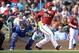 Feb 26, 2014; Salt River Pima-Maricopa, AZ, USA; Arizona Diamondbacks center fielder Gerardo Parra (8) hits a triple against the Los Angeles Dodgers during the second inning at Salt River Fields at Talking Stick. Mandatory Credit: Joe Camporeale-USA TODAY