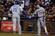 SAN FRANCISCO, CA - SEPTEMBER 25: Carl Crawford #25 of the Los Angeles Dodgers is congratulated by Skip Schumaker #55 after Crawford scored during the fourth inning against the San Francisco Giants at AT&T Park on September 25, 2013 in San Francisco, Cal