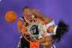 Jason Collins battles Jordan Hill for a rebound during the Nets' 108-102 win over the Los Angeles Lakers on Feb. 23.