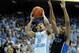 CHAPEL HILL, NC - FEBRUARY 20: Jabari Parker #1 of the Duke Blue Devils defends a shot by Marcus Paige #5 of the North Carolina Tar Heels during their game at the Dean Smith Center on February 20, 2014 in Chapel Hill, North Carolina. North Carolina won 7