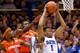 DURHAM, NC - FEBRUARY 22: Jabari Parker #1 of the Duke Blue Devils takes a rebound away from C.J. Fair #5 and Jerami Grant #3 of the Syracuse Orange during their game at Cameron Indoor Stadium on February 22, 2014 in Durham, North Carolina. Duke won 66-6