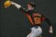 Feb 16, 2014; Scottsdale, AZ, USA; San Francisco Giants starting pitcher Tim Lincecum (55) throws in the bullpen during camp at Scottsdale Stadium. Mandatory Credit: Rick Scuteri-USA TODAY Sports