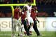 TUCSON, AZ - SEPTEMBER 17: Linebacker Shayne Skov #11 of the Stanford Cardinal is helped off the field after an injury during the college football game against the Arizona Wildcats at Arizona Stadium on September 17, 2011 in Tucson, Arizona. The Cardinal