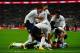 England celebrate a goal against Poland in October.