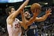Feb 25, 2014; Phoenix, AZ, USA; Minnesota Timberwolves point guard Ricky Rubio (9) drives on Phoenix Suns shooting guard Goran Dragic (1) during the fist quarter at US Airways Center. Mandatory Credit: Rick Scuteri-USA TODAY Sports
