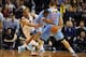 Feb 23, 2014; Oklahoma City, OK, USA; Los Angeles Clippers point guard Chris Paul (3) runs around a pick set by Los Angeles Clippers power forward Blake Griffin (32) while being pursued by Oklahoma City Thunder point guard Russell Westbrook (0) during the