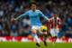 MANCHESTER, ENGLAND - FEBRUARY 22: David Silva of Manchester City in action during the Barclays Premier League match between Manchester City and Stoke City at the Etihad Stadium on February 22, 2014 in Manchester, England. (Photo by Paul Thomas/Getty Im