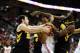 COLUMBUS, OH - JANUARY 12: Trey McDonald #55 of the Ohio State Buckeyes, Zach McCabe #15 of the Iowa Hawkeyes, and Gabriel Olaseni #0 of the Iowa Hawkeyes fight for a loose ball on January 12, 2014 at Value City Arena in Columbus, Ohio. (Photo by Ryan