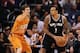 Feb 21, 2014; Phoenix, AZ, USA; San Antonio Spurs guard Shannon Brown (1) is defended by Phoenix Suns guard Goran Dragic (1) in the first half at US Airways Center. Mandatory Credit: Jennifer Stewart-USA TODAY Sports