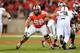 COLUMBUS, OH - OCTOBER 26: Taylor Decker #68 of the Ohio State Buckeyes blocks against the Penn State Nittany Lions at Ohio Stadium on October 26, 2013 in Columbus, Ohio. (Photo by Jamie Sabau/Getty Images)
