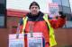 STOKE ON TRENT, ENGLAND - FEBRUARY 01: A Stoke City fanzine seller is pictured outside the ground prior to the Barclays Premier League match between Stoke City and Manchester United at Britannia Stadium on February 1, 2014 in Stoke on Trent, England. (Ph