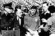 Giorgio Ferrini is escorted from the field after being sent off.