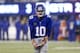 EAST RUTHERFORD, NJ - DECEMBER 29: Eli Manning #10 of the New York Giants looks at an official against the Washington Redskins during their game at MetLife Stadium on December 29, 2013 in East Rutherford, New Jersey. (Photo by Jeff Zelevansky/Getty Ima