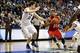 Feb 27, 2014; St. Louis, MO, USA; Duquesne Dukes forward Jeremiah Jones (23) drives to the basket around Saint Louis Billikens forward Rob Loe (51) during the first half at Chaifetz Arena. Mandatory Credit: Scott Kane-USA TODAY Sports