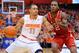 SYRACUSE, NY - FEBRUARY 15: Tyler Ennis #11 of the Syracuse Orange drives to the basket against the defense of Anthony Barber #2 of the North Carolina State Wolfpack during the first half at the Carrier Dome on February 15, 2014 in Syracuse, New York. (