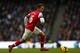 MANCHESTER, ENGLAND - DECEMBER 14: Aaron Ramsey of Arsenal in action during the Barclays Premier League match between Manchester City and Arsenal at Etihad Stadium on December 14, 2013 in Manchester, England. (Photo by Clive Brunskill/Getty Images)