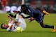 PARIS, FRANCE - FEBRUARY 24: Blaise Matuidi of PSG and Mathieu Valbuena of Marseille battle for the ball during the Ligue 1 match between Paris Saint-Germain FC and Olympique de Marseille at Parc des Princes on February 24, 2013 in Paris, France. (Photo