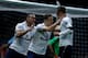 Steven Caulker and Michael Dawson celebrate with Gylfi Sigurdsson after the latter scored against West Ham United last season.