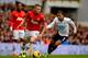 LONDON, ENGLAND - DECEMBER 01: Aaron Lennon of Tottenham Hotspur marshalls Tom Cleverley of Manchester United during the Barclays Premier League Match between Tottenham Hotspur and Manchester United at White Hart Lane on December 1, 2013 in London, Engl