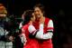 LONDON, ENGLAND - JANUARY 04: Arsenal goalscorers Santi Cazorla (L) and Tomas Rosicky (R) celebrate their team's 2-0 victory during the Budweiser FA Cup third round match between Arsenal and Tottenham Hotspur at Emirates Stadium on January 4, 2014 in Lo
