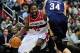 Feb 22, 2014; Washington, DC, USA; Washington Wizards forward Nene (42) is defended by New Orleans Pelicans center Greg Stiemsma (34) at Verizon Center. Mandatory Credit: Evan Habeeb-USA TODAY Sports
