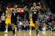 DENVER, CO - FEBRUARY 27: Jason Collins #98 of the Brooklyn Nets celebrates after making a basket with teammate Alan Anderson #6 during a game against the Denver Nuggets at Pepsi Center on February 27, 2014 in Denver, Colorado. Collins is the first openl