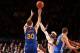 NEW YORK, NY - FEBRUARY 28: Stephen Curry #30 of the Golden State Warriors shoots against Carmelo Anthony #7 of the New York Knicks during a game at Madison Square Garden in New York City on February 28, 2014. NOTE TO USER: User expressly acknowledges an