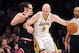 February 9, 2014; Los Angeles, CA, USA; Los Angeles Lakers center Chris Kaman (9) moves the ball against the defense of Chicago Bulls center Joakim Noah (13) during the first half at Staples Center. Mandatory Credit: Gary A. Vasquez-USA TODAY Sports