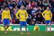 STOKE ON TRENT, ENGLAND - MARCH 01: Jack Wilshere of Arsenal and his team-mates look dejected after conceding the opening goal during the Barclays Pemier League match between Stoke City and Arsenal at the Britannia Stadium on March 1, 2014 in Stoke on Tr
