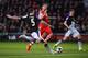 SOUTHAMPTON, ENGLAND - MARCH 01: Jay Rodriguez of Southampton challenges for the ball with Daniel Agger of Liverpool during the Barclays Premier League match between Southampton and Liverpool at St Mary's Stadium on March 1, 2014 in Southampton, England.