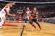 PORTLAND, OR - NOVEMBER 22: Derrick Rose #1 of the Chicago Bulls drives to the basket against the Portland Trail Blazers on November 22, 2013 at the Moda Center Arena in Portland, Oregon. NOTE TO USER: User expressly acknowledges and agrees that, by down