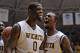WICHITA, KS - MARCH 01: Players Chadrack Lufile #0 and Nick Wiggins #15 of the Wichita State Shockers react after a score against the Missouri State Bears during the first half on March 1, 2014 at Charles Koch Arena in Wichita, Kansas. (Photo by Peter A