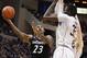 Mar 1, 2014; Hartford, CT, USA; Cincinnati Bearcats guard Sean Kilpatrick (23) shoots against Connecticut Huskies center Amida Brimah (35) in the second half at XL Center. UConn defeated the Cincinnati Bearcats 51-45. Mandatory Credit: David Butler II-USA