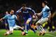 MANCHESTER, ENGLAND - FEBRUARY 15: Eden Hazard (C) of Chelsea holds off the challenge of Pablo Zabaleta (L) and James Milner (R) of Manchester City during the FA Cup Fifth Round match between Manchester City and Chelsea at the Etihad Stadium on February