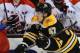 BOSTON, MA - MARCH 1: Joel Ward #42 of the Washington Capitals checks into the boards against Torey Krug #47 of the Boston Bruins at the TD Garden on March 1, 2014 in Boston, Massachusetts. (Photo by Steve Babineau/NHLI via Getty Images)