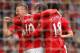 MANCHESTER, ENGLAND - AUGUST 28: Wayne Rooney of Manchester United celebrates Tom Cleverley and Ashley Young after scoring his third goal from the penalty spot during the Barclays Premier League match between Manchester United and Arsenal at Old Trafford