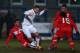 TELFORD, ENGLAND - MARCH 21: Nick Powell (2L) of England is fouled by Hakan Cinemre (L) of Turkey during the England U19's versus Turkey U19's International match at New Bucks Head Stadium on March 21, 2013 in Telford, England. (Photo by Michael Steele/