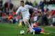 MADRID, SPAIN - MARCH 02: Cristiano Ronaldo (L) of Real Madrid CF beats Raul Garcia of Club Atletico de Madrid during the La Liga match between Club Atletico de Madrid and Real Madrid CF at Vicente Calderon Stadium on March 2, 2014 in Madrid, Spain. (P
