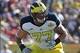 January 1,2013; Tampa, FL, USA; Michigan Wolverines offensive linesman Taylor Lewan (77) blocks against the South Carolina Gamecocks during the first quarter of the 2013 Outback Bowl at Raymond James Stadium. Mandatory Credit: Kim Klement-USA TODAY Sports